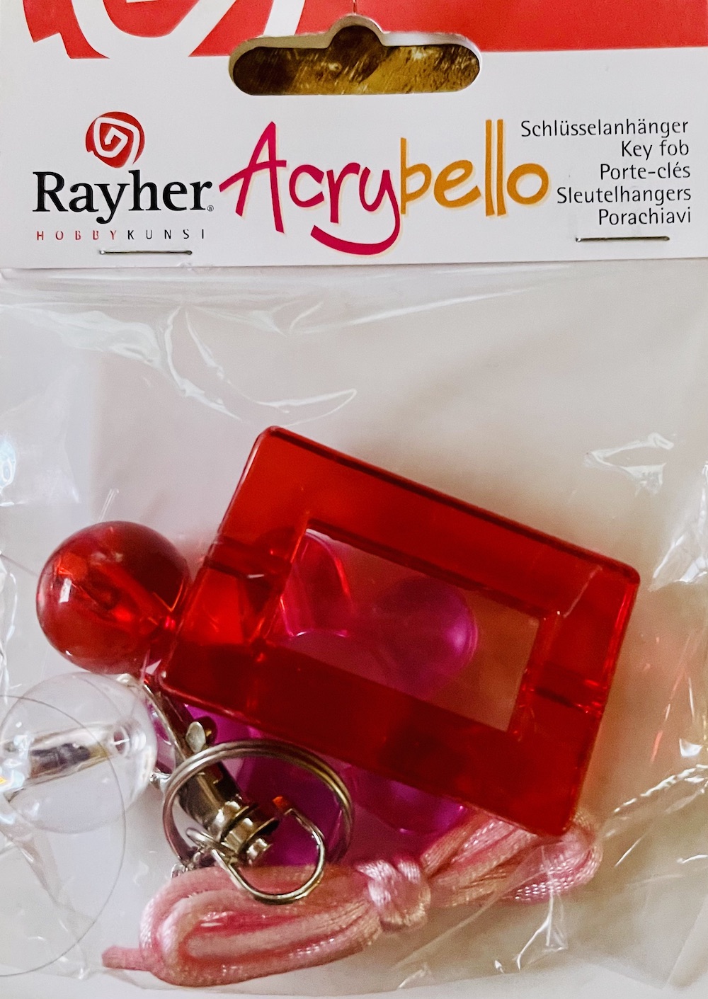 Acrybello Schlüsselanhänger rot/rosa mit Blume