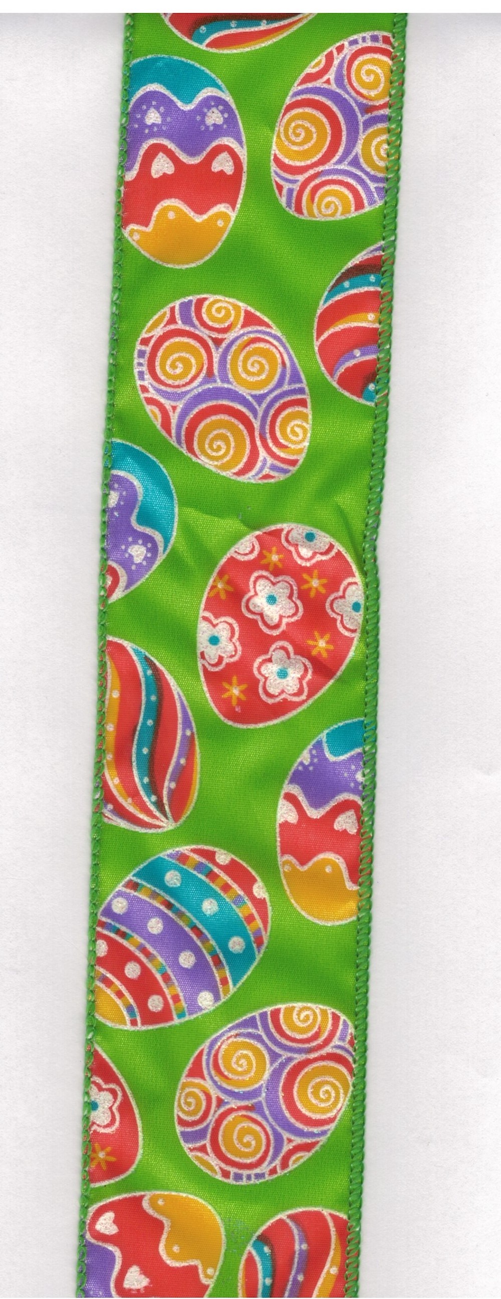 Geschenkband mit Drahtkante, 6 cm breit, Glitzer-Eier auf hellgrünem Grund, Meterware